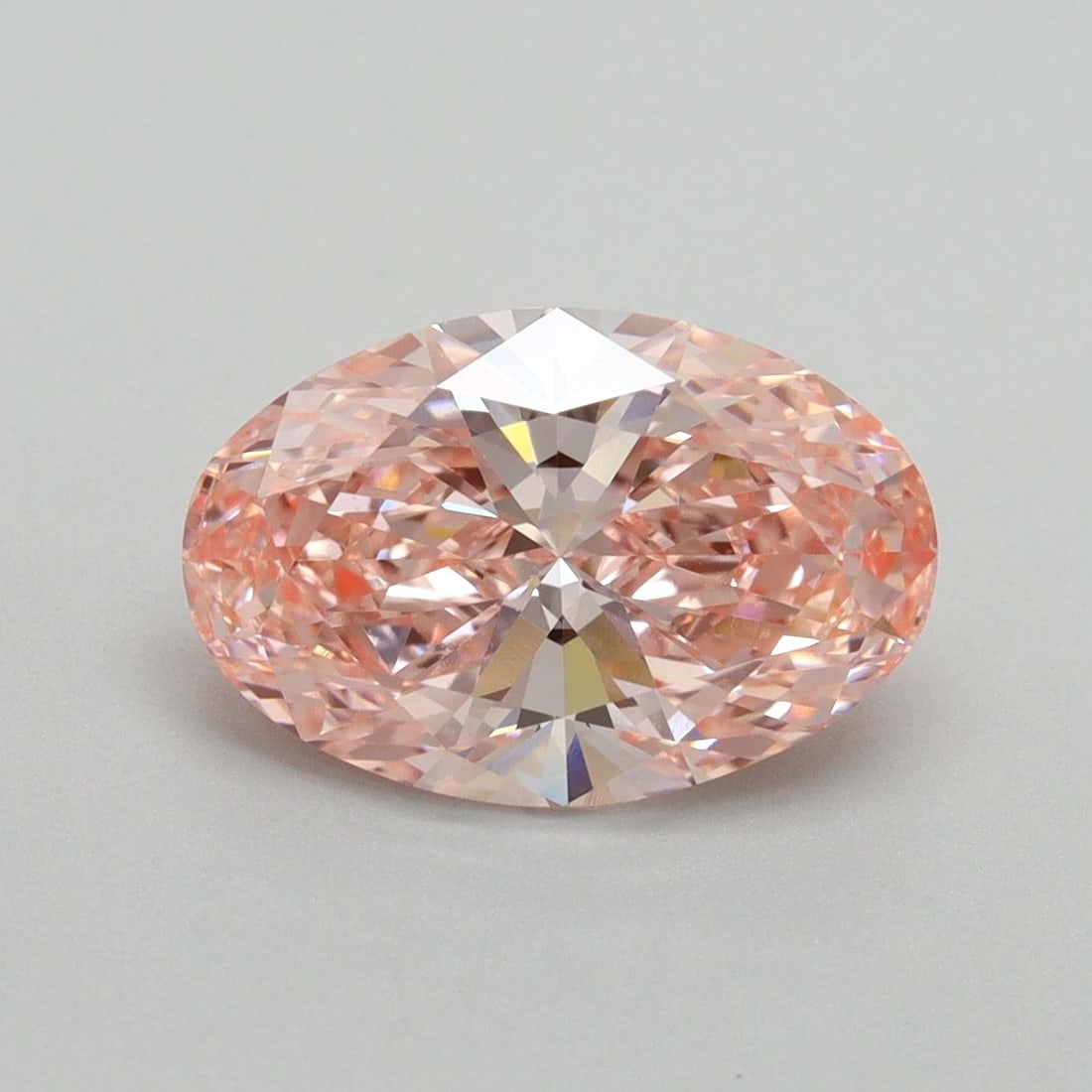 Loose Diamond - OVAL 2.58ct Fancy Vivid Pink VVS2: Loose Diamond - OVAL 2.58ct Fancy Vivid Pink VVS2 Source: This is a real non-mined Diamond that has been grown in a lab Shape: OVAL Carats: 2.58 Color: Fancy Vivid Pink Certification: IGI Video: