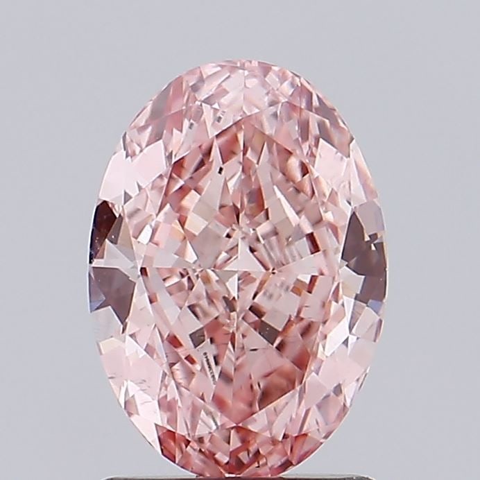 Loose Diamond - OVAL 1.52ct Fancy Intense Pink VS2: Loose Diamond - OVAL 1.52ct Fancy Intense Pink VS2 Source: This is a real non-mined Diamond that has been grown in a lab Shape: OVAL Carats: 1.52 Color: Fancy Intense Pink Certification: IGI Video: