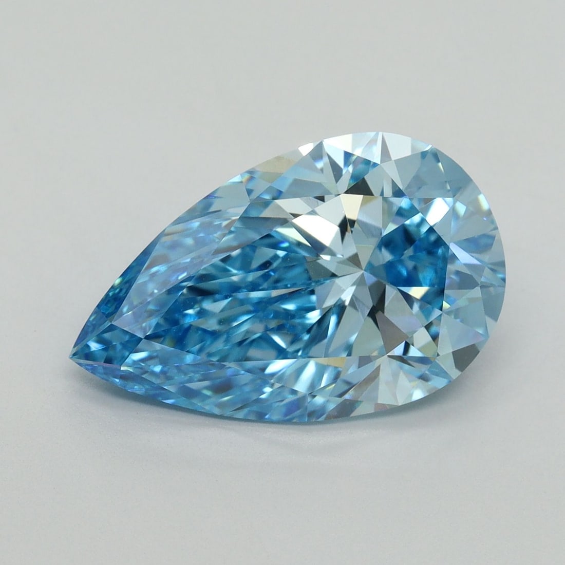 Loose Diamond - PEAR 5.05ct Fancy Vivid Blue VVS2: Loose Diamond - PEAR 5.05ct Fancy Vivid Blue VVS2 Source: This is a real non-mined Diamond that has been grown in a lab Shape: PEAR Carats: 5.05 Color: Fancy Vivid Blue Certification: IGI Video: