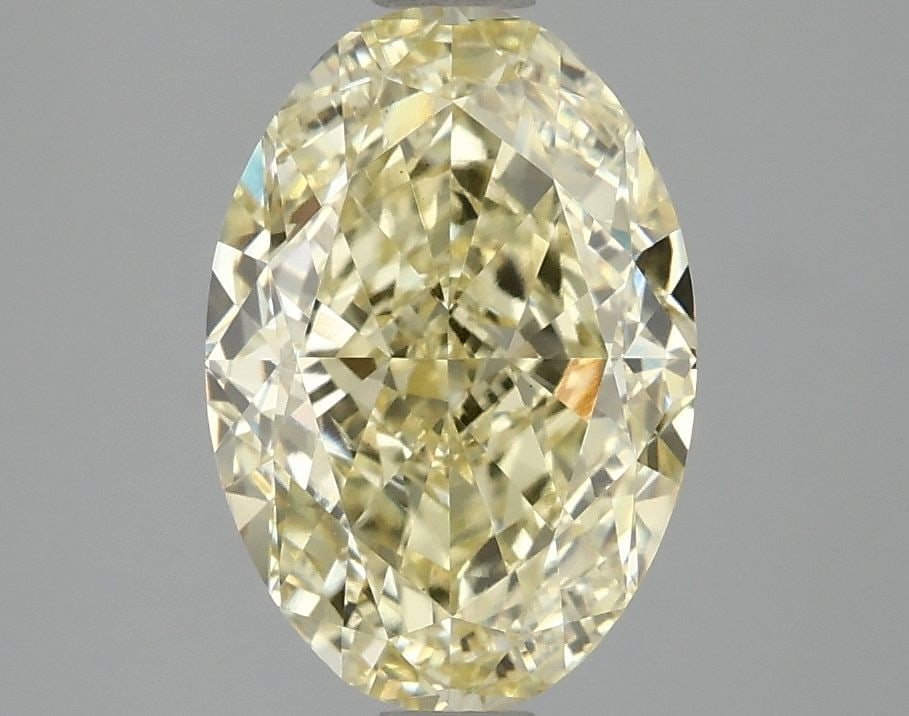 Loose Diamond - OVAL 3.05ct Fancy Vivid Yellow VS1: Loose Diamond - OVAL 3.05ct Fancy Vivid Yellow VS1 Source: This is a real non-mined Diamond that has been grown in a lab Shape: OVAL Carats: 3.05 Color: Fancy Vivid Yellow Certification: IGI Video: