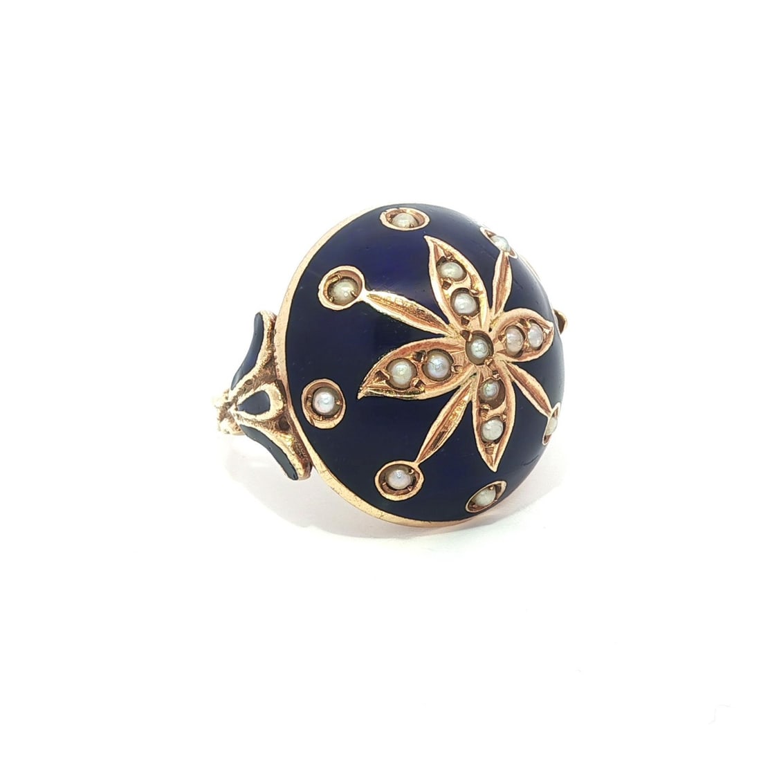 Vintage Floral Domed Ring in Yellow Gold with Blue Enamel and Seed Pearls: Vintage Floral Domed Ring in Yellow Gold with Blue Enamel and Seed Pearls This vintage domed platter ring features a stunning floral design adorned with genuine cultured seed pearls and vibrant blue e