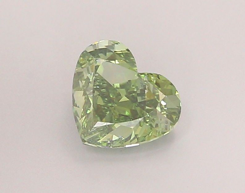 Loose Diamond - HEART 1.39ct Fancy Vivid Green VS1: Loose Diamond - HEART 1.39ct Fancy Vivid Green VS1 Source: This is a real non-mined Diamond that has been grown in a lab Shape: HEART Carats: 1.39 Color: Fancy Vivid Green Certification: IGI Video: