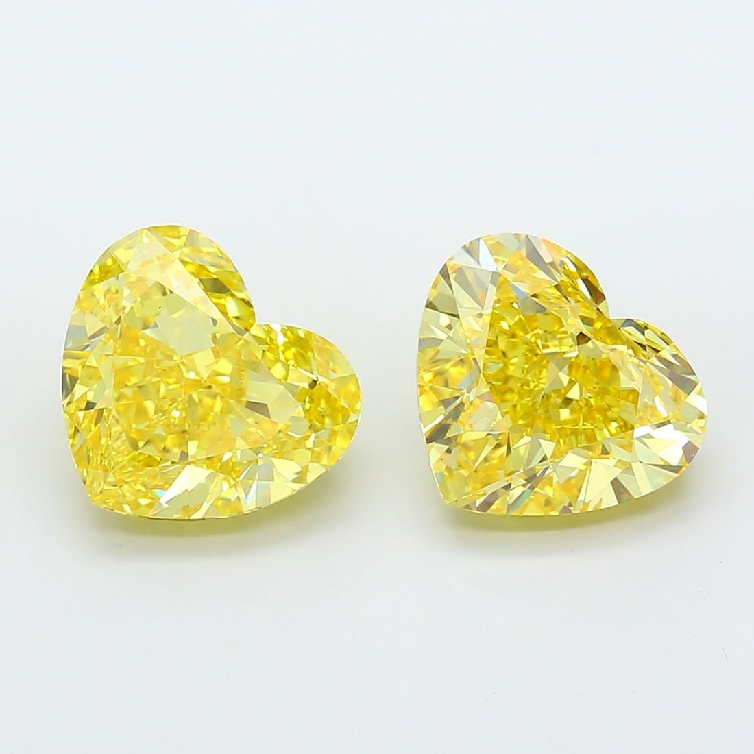 Loose Diamond - HEART 7.02ct Fancy Vivid Yellow VS1: Loose Diamond - HEART 7.02ct Fancy Vivid Yellow VS1 Source: This is a real non-mined Diamond that has been grown in a lab Shape: HEART Carats: 7.02 Color: Fancy Vivid Yellow Certification: IGI Video:
