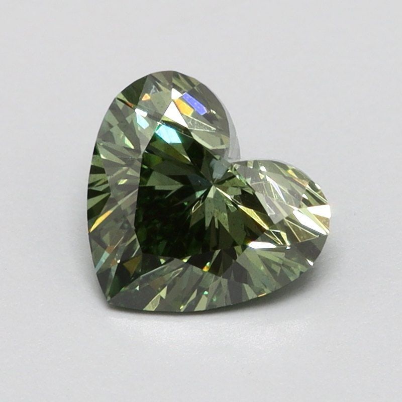 Loose Diamond - HEART 0.42ct Fancy Vivid Green SI1: Loose Diamond - HEART 0.42ct Fancy Vivid Green SI1 Source: This is a real non-mined Diamond that has been grown in a lab Shape: HEART Carats: 0.42 Color: Fancy Vivid Green Certification: NONE Video: