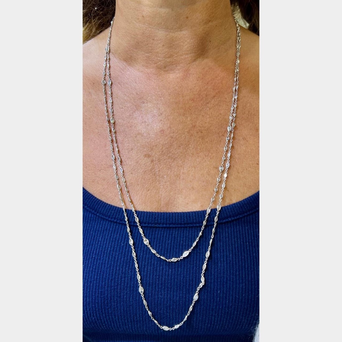 Platinum 18.50 Ct Marquise Diamond Necklace 55 Inches: Platinum 18.50 Ct Marquise Diamond Necklace 55 Inches This exquisite Platinum Necklace features a stunning design with 155 Marquise Diamonds totaling approximately 18.50 carats. The diamonds are grade