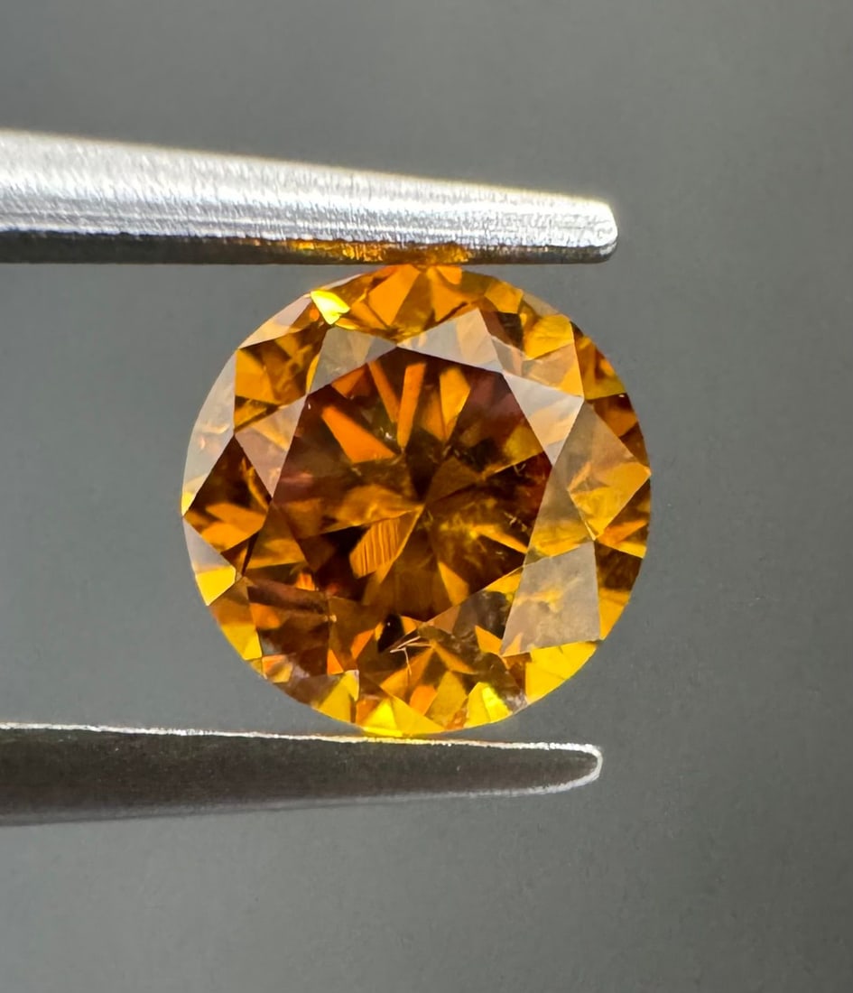 Loose Diamond - ROUND 0.5ct Fancy Deep Yellow Orange SI2: Loose Diamond - ROUND 0.5ct Fancy Deep Yellow Orange SI2 Source: Natural Shape: ROUND Carats: 0.5 Color: Fancy Deep Yellow Orange Certification: GIA The Diamond Depot Guarantee: All items in this auct
