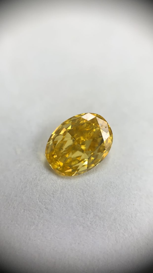 Loose Diamond - OVAL 0.45ct Fancy Vivid Orangey Yellow VS1: Loose Diamond - OVAL 0.45ct Fancy Vivid Orangey Yellow VS1 Source: Natural Shape: OVAL Carats: 0.45 Color: Fancy Vivid Orangey Yellow Certification: GIA Video: