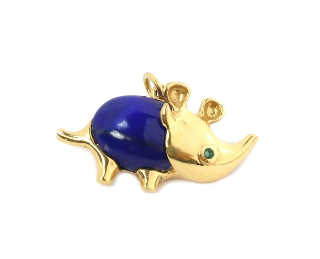 Vintage 18k Yellow Gold Rhino Brooch with Lapis and Emerald: Vintage 18k Yellow Gold Rhino Brooch with Lapis and Emerald This exquisite vintage rhinoceros pin brooch is crafted from 18k yellow gold, showcasing a stunning design. The brooch features a large oval