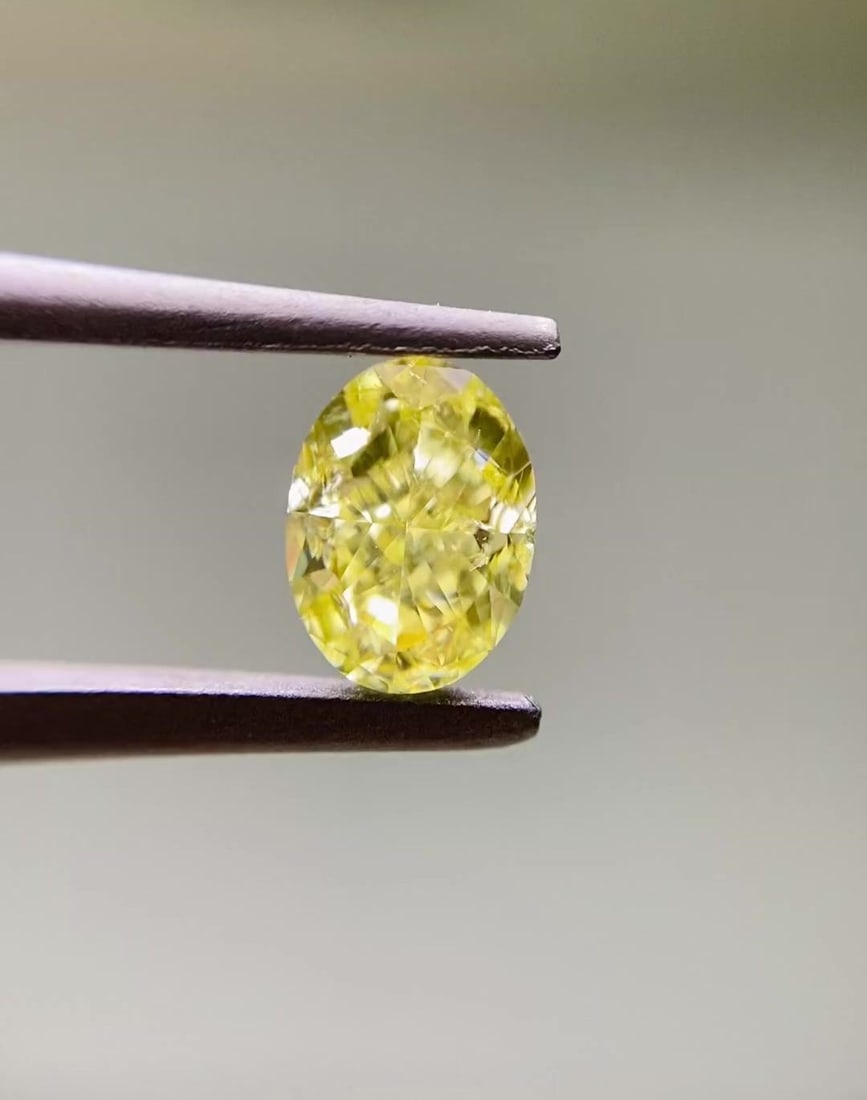 Loose Diamond - OVAL 0.7ct Fancy Intense Yellow SI2: Loose Diamond - OVAL 0.7ct Fancy Intense Yellow SI2 Source: Natural Shape: OVAL Carats: 0.7 Color: Fancy Intense Yellow Certification: GIA Video: