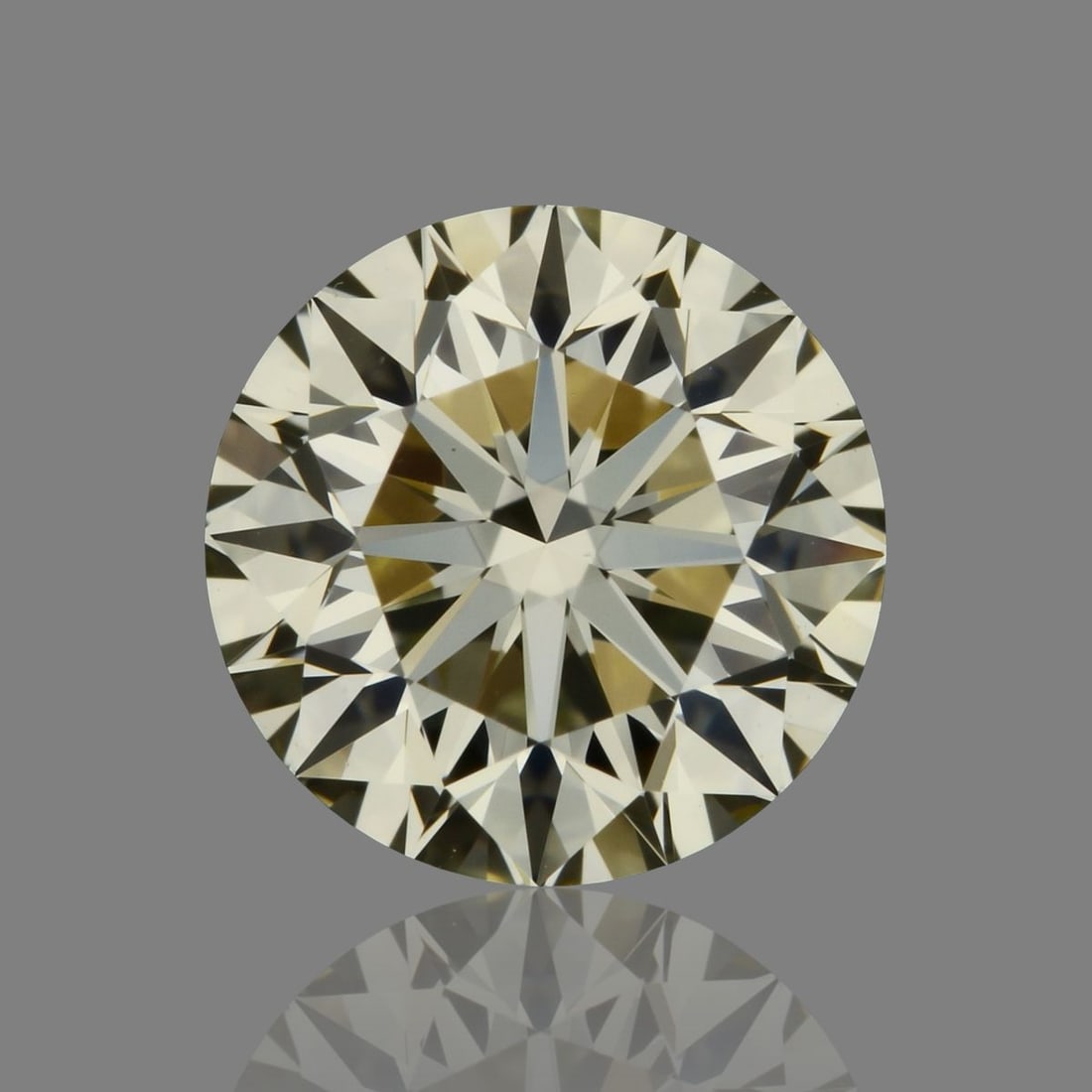 Loose Diamond - ROUND 0.71ct O-P VVS2: Loose Diamond - ROUND 0.71ct O-P VVS2 Source: Natural Shape: ROUND Carats: 0.71 Color: O-P Certification: IGI Video: