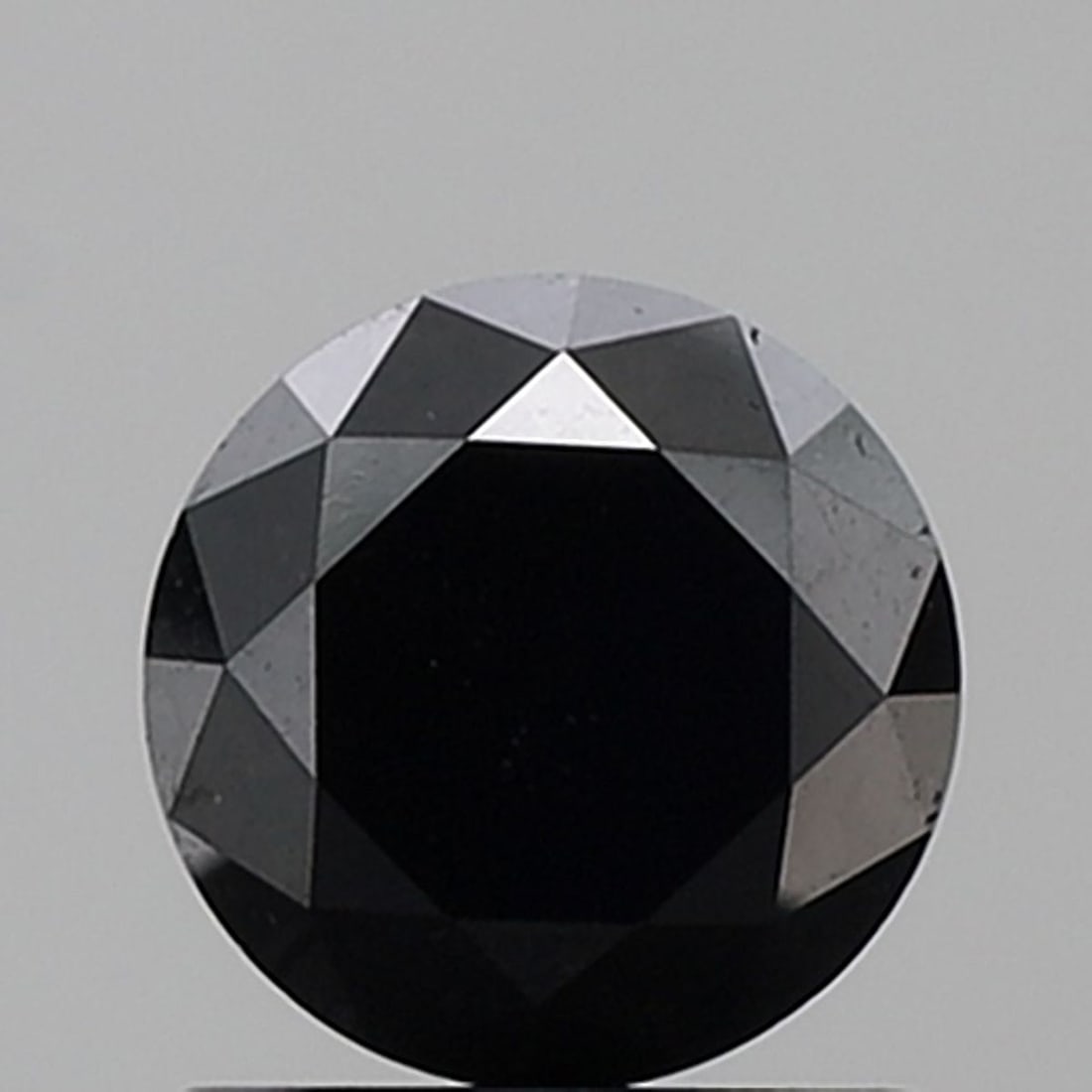 Loose Diamond - ROUND 1.22ct Fancy Black VS1: Loose Diamond - ROUND 1.22ct Fancy Black VS1 Source: Natural Shape: ROUND Carats: 1.22 Color: Fancy Black Certification: NONE Video: Video Link The Diamond Depot Guarantee: All items in this
