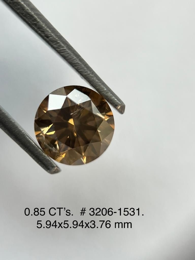 Loose Diamond - ROUND 0.85ct Brown SI2: Loose Diamond - ROUND 0.85ct Brown SI2 Source: Natural Shape: ROUND Carats: 0.85 Color: Brown Certification: NONE Video: