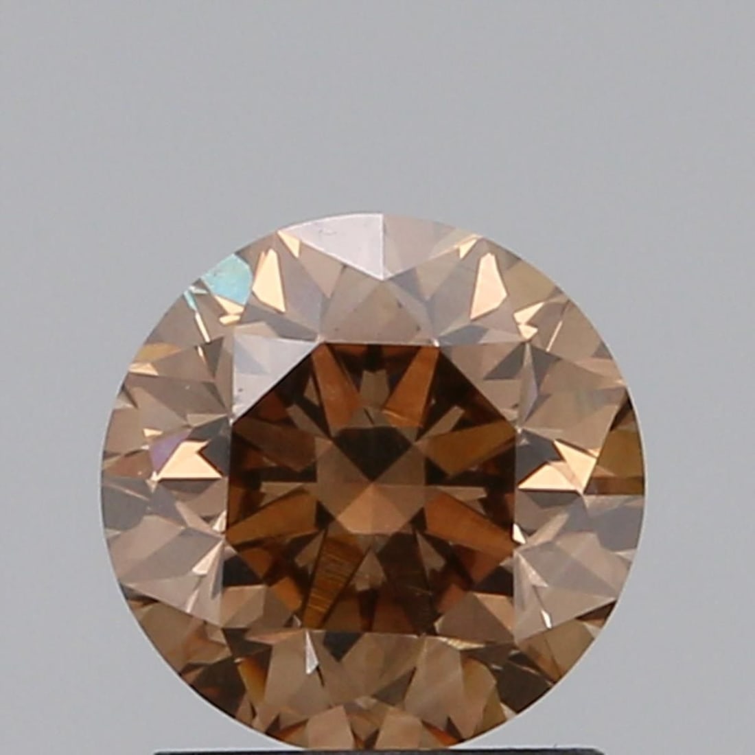 Loose Diamond - ROUND 1.22ct Fancy Dark Orangey Brown VS1: Loose Diamond - ROUND 1.22ct Fancy Dark Orangey Brown VS1 Source: Natural Shape: ROUND Carats: 1.22 Color: Fancy Dark Orangey Brown Certification: GIA Video: