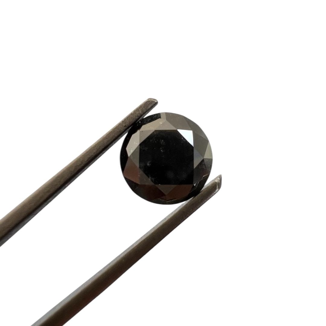 Loose Diamond - ROUND 1.33ct Fancy Black: Loose Diamond - ROUND 1.33ct Fancy Black Source: Natural Shape: ROUND Carats: 1.33 Color: Fancy Black Certification: GIA The Diamond Depot Guarantee: All items in this auction are guaranteed to be 100