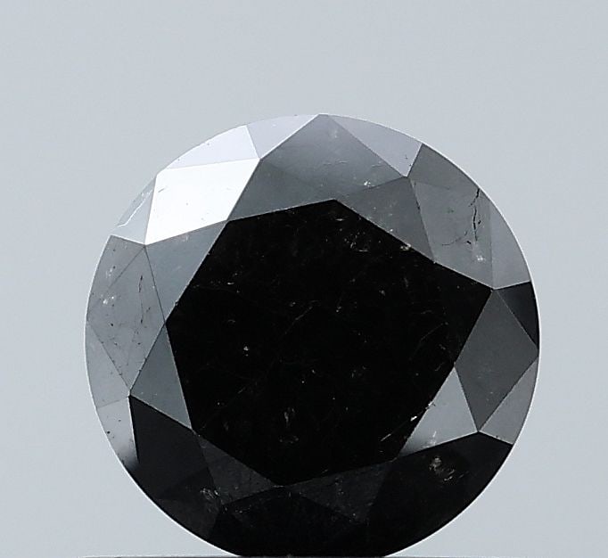 Loose Diamond - ROUND 0.84ct Fancy Black VVS2: Loose Diamond - ROUND 0.84ct Fancy Black VVS2 Source: Natural Shape: ROUND Carats: 0.84 Color: Fancy Black Certification: NONE Video: