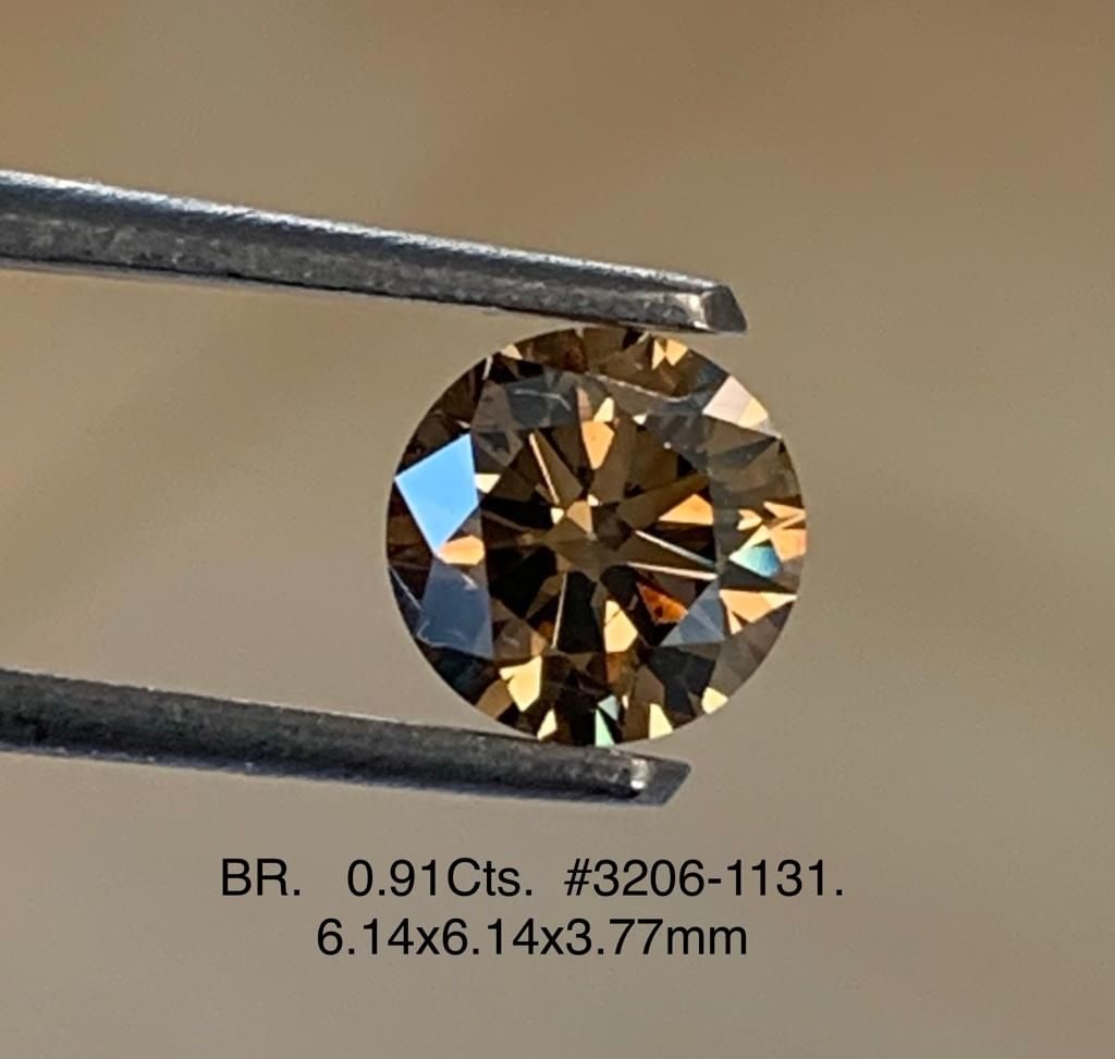 Loose Diamond - ROUND 0.91ct Brown VS2: Loose Diamond - ROUND 0.91ct Brown VS2 Source: Natural Shape: ROUND Carats: 0.91 Color: Brown Certification: NONE Video: