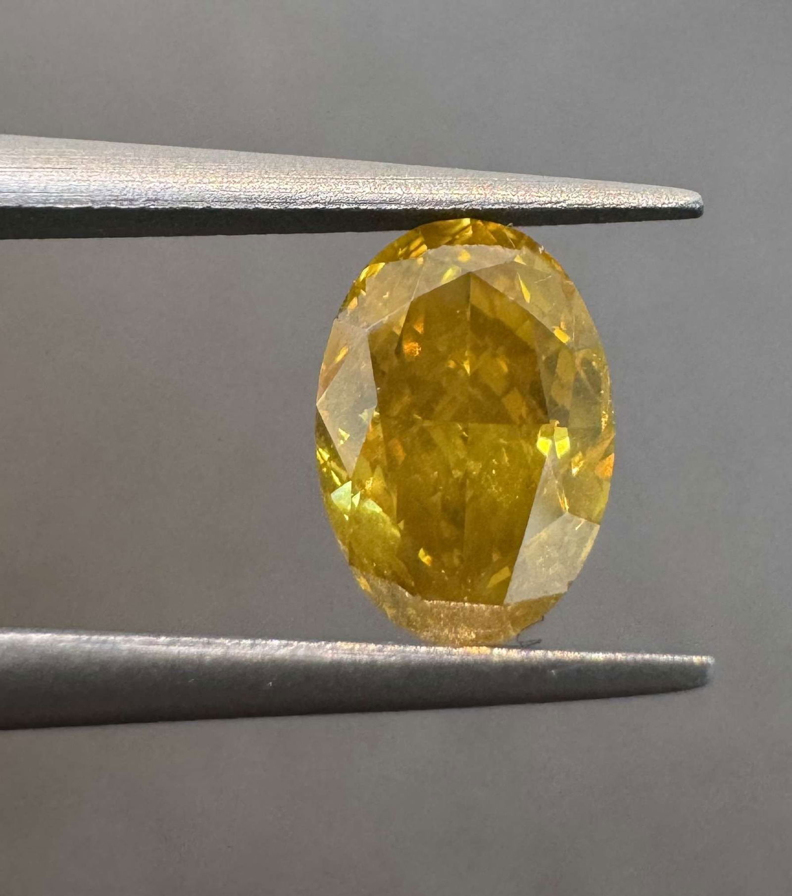 Loose Diamond - OVAL 0.77ct Fancy Deep Brownish Orangey Yellow I1: Loose Diamond - OVAL 0.77ct Fancy Deep Brownish Orangey Yellow I1 Source: Natural Shape: OVAL Carats: 0.77 Color: Fancy Deep Brownish Orangey Yellow Certification: GIA Video: