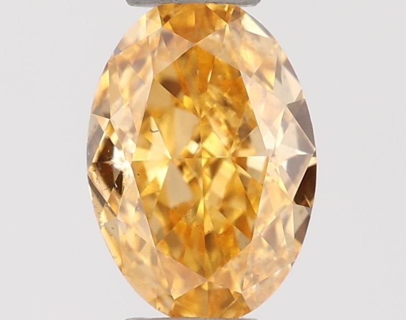 Loose Diamond - OVAL 0.31ct Fancy Intense Yellowish Orange SI2: Loose Diamond - OVAL 0.31ct Fancy Intense Yellowish Orange SI2 Source: Natural Shape: OVAL Carats: 0.31 Color: Fancy Intense Yellowish Orange Certification: GIA The Diamond Depot Guarantee: All items