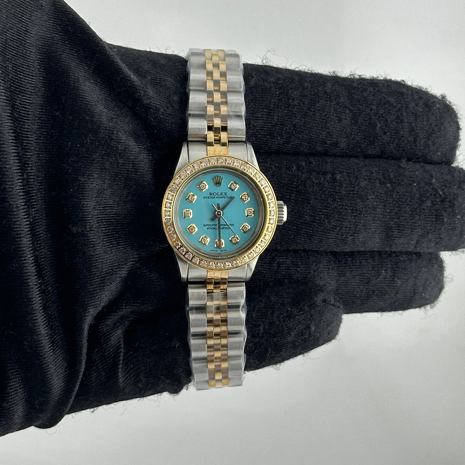 Ladies Oyster Perpetual 6723 Watch with Aftermarket Tiffany Diamond Dial: Ladies Oyster Perpetual 6723 Watch with Aftermarket Tiffany Diamond Dial This ladies' Rolex Oyster Perpetual features an aftermarket Tiffany diamond dial and a pave plated diamond bezel. It is paired