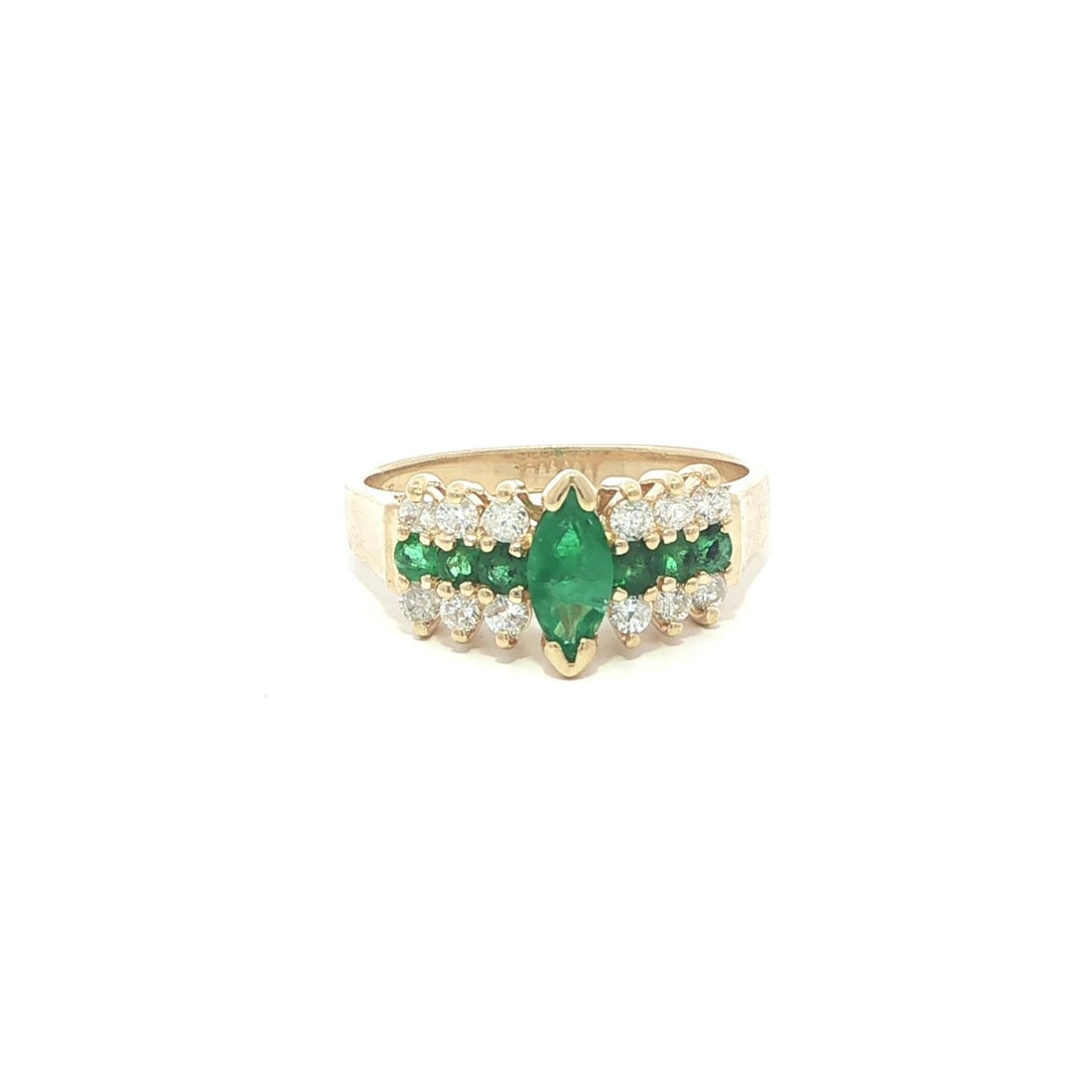 Marquise Emerald and Diamond Pyramid Band Ring in 14k Yellow Gold: Marquise Emerald and Diamond Pyramid Band Ring in 14k Yellow Gold This 14k yellow gold pyramid band ring features a striking combination of natural emeralds and diamonds. The centerpiece is a