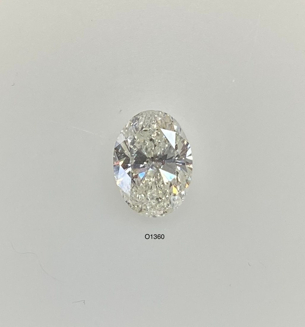 Loose Diamond - OVAL 1.01ct I I1: Loose Diamond - OVAL 1.01ct I I1 Source: Natural Shape: OVAL Carats: 1.01 Color: I Clarity: I1 Certification: NONE The Diamond Depot Guarantee: All items in this auction are guaranteed to be 100% auth