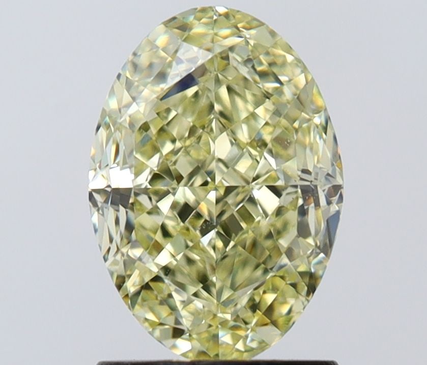 Loose Diamond - OVAL 2.01ct Fancy Light Yellow VS2: Loose Diamond - OVAL 2.01ct Fancy Light Yellow VS2 Source: Natural Shape: OVAL Carats: 2.01 Color: Fancy Light Yellow Certification: GIA Video: