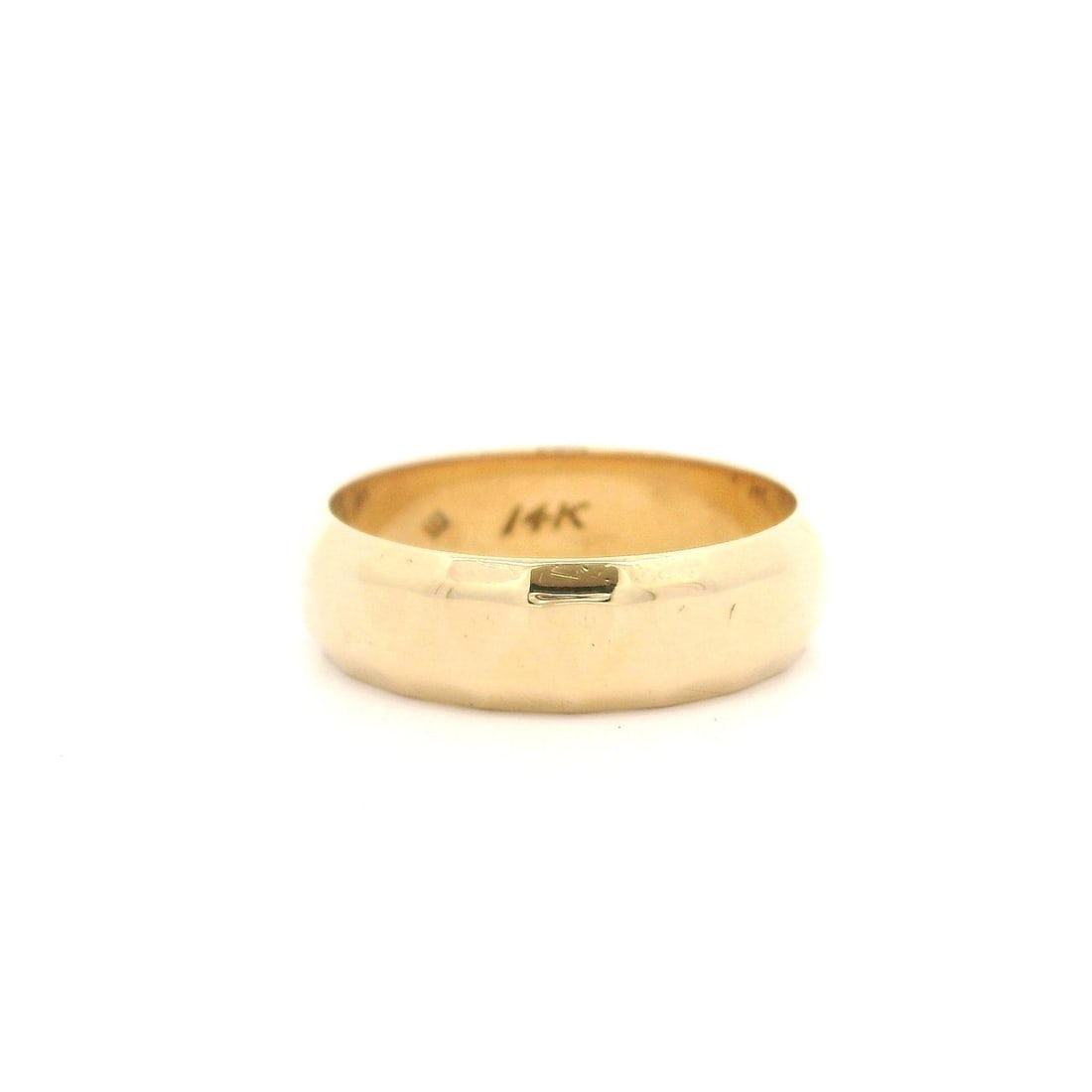 14k Solid Yellow Gold 5.9mm Polished Band Ring Size 9: 14k Solid Yellow Gold 5.9mm Polished Band Ring Size 9 This exquisite band ring features a solid construction in 14k yellow gold, offering both durability and elegance. With a polished, faceted surface
