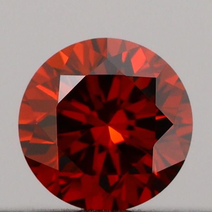 Loose Diamond - ROUND 0.18ct Fancy Deep Orange VS1: Loose Diamond - ROUND 0.18ct Fancy Deep Orange VS1 Source: This is a real non-mined Diamond that has been grown in a lab Shape: ROUND Carats: 0.18 Color: Fancy Deep Orange Certification: IGI Video: