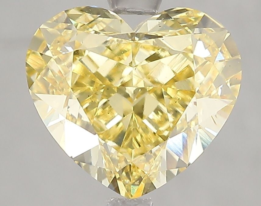 Loose Diamond - HEART 4.01ct Fancy Intense Yellow VS2: Loose Diamond - HEART 4.01ct Fancy Intense Yellow VS2 Source: This is a real non-mined Diamond that has been grown in a lab Shape: HEART Carats: 4.01 Color: Fancy Intense Yellow Certification: IGI Vid