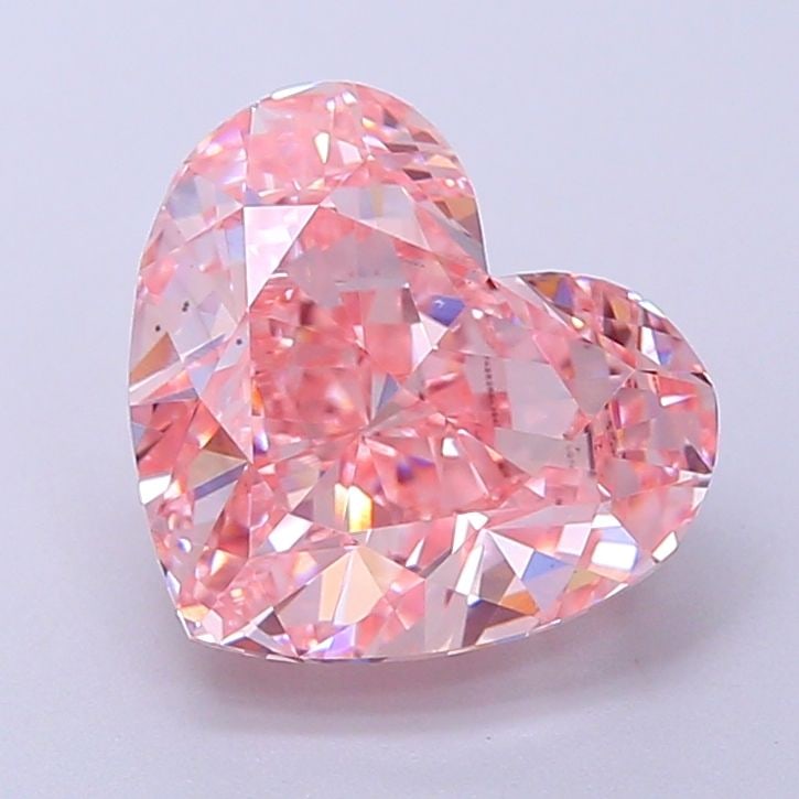 Loose Diamond - HEART 3.03ct Fancy Vivid Pink VS1: Loose Diamond - HEART 3.03ct Fancy Vivid Pink VS1 Source: This is a real non-mined Diamond that has been grown in a lab Shape: HEART Carats: 3.03 Color: Fancy Vivid Pink Certification: IGI Video: