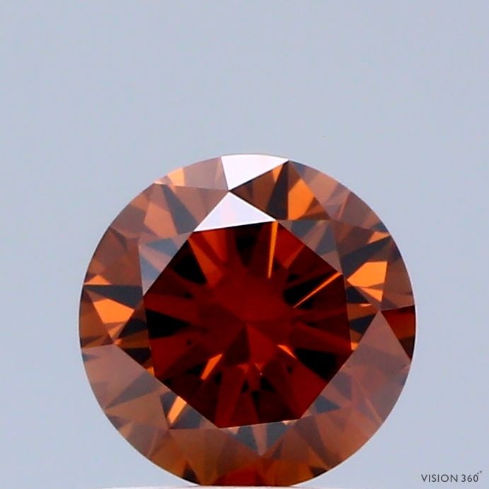 Loose Diamond - ROUND 0.66ct Fancy Deep Orange VVS2: Loose Diamond - ROUND 0.66ct Fancy Deep Orange VVS2 Source: This is a real non-mined Diamond that has been grown in a lab Shape: ROUND Carats: 0.66 Color: Fancy Deep Orange Certification: IGI Video: