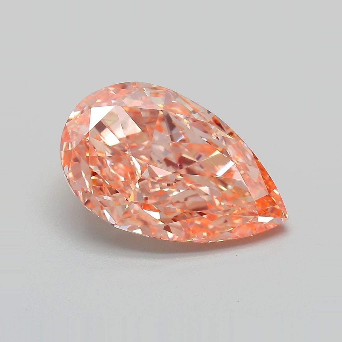 Loose Diamond - PEAR 5.15ct Fancy Vivid Pink Orange VVS2: Loose Diamond - PEAR 5.15ct Fancy Vivid Pink Orange VVS2 Source: This is a real non-mined Diamond that has been grown in a lab Shape: PEAR Carats: 5.15 Color: Fancy Vivid Pink Orange Certification: IG