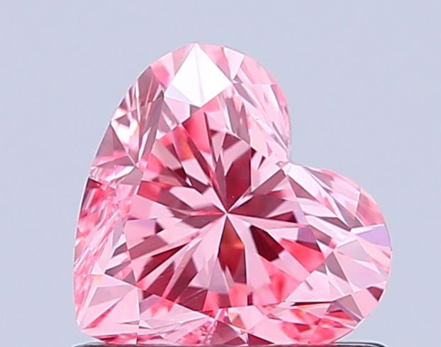Loose Diamond - HEART 0.79ct Fancy Vivid Pink VS1: Loose Diamond - HEART 0.79ct Fancy Vivid Pink VS1 Source: This is a real non-mined Diamond that has been grown in a lab Shape: HEART Carats: 0.79 Color: Fancy Vivid Pink Certification: IGI Video: