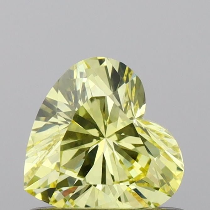 Loose Diamond - HEART 0.56ct Fancy Vivid Yellow VVS2: Loose Diamond - HEART 0.56ct Fancy Vivid Yellow VVS2 Source: This is a real non-mined Diamond that has been grown in a lab Shape: HEART Carats: 0.56 Color: Fancy Vivid Yellow Certification: IGI Video: