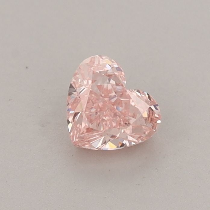 Loose Diamond - HEART 0.44ct Fancy Vivid Pink VS1: Loose Diamond - HEART 0.44ct Fancy Vivid Pink VS1 Source: This is a real non-mined Diamond that has been grown in a lab Shape: HEART Carats: 0.44 Color: Fancy Vivid Pink Certification: IGI The Diamond