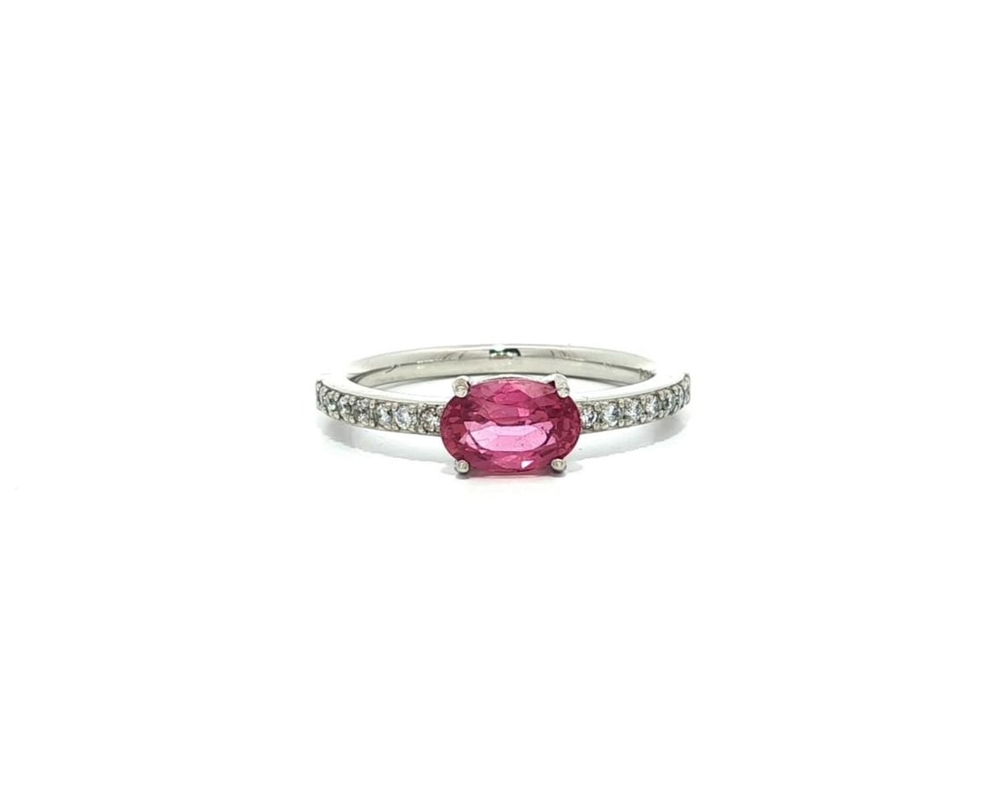 Platinum GIA Certified 1.14ct Pink Sapphire Diamond East West Ring: Platinum GIA Certified 1.14ct Pink Sapphire Diamond East West Ring Presenting a stunning oval pink sapphire and diamond band ring, expertly crafted in solid platinum. This exquisite piece features a c