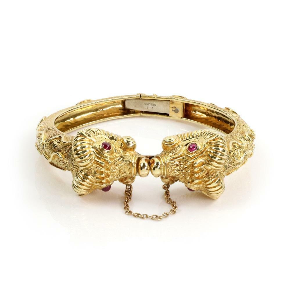 Cellino 1.10ct Ruby 18k Yellow Gold Double Rams Head Bracelet: Cellino 1.10ct Ruby 18k Yellow Gold Double Rams Head Bracelet This exquisite bracelet from designer Cellino showcases a stunning design crafted from 18k yellow gold. The piece features a double carved
