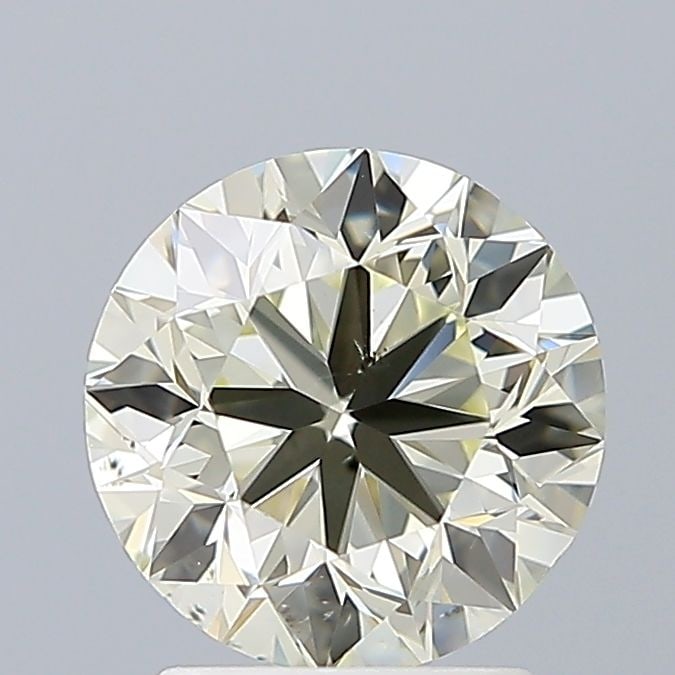 Loose Diamond - ROUND 2.01ct O-P SI1: Loose Diamond - ROUND 2.01ct O-P SI1 Source: Natural Shape: ROUND Carats: 2.01 Color: O-P Certification: NONE Video: