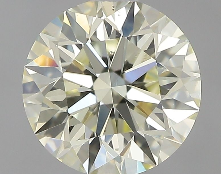 Loose Diamond - ROUND 0.75ct O-P VS2: Loose Diamond - ROUND 0.75ct O-P VS2 Source: Natural Shape: ROUND Carats: 0.75 Color: O-P Certification: IGI Video: