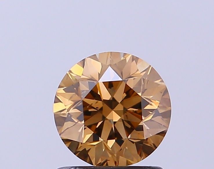 Loose Diamond - ROUND 1.01ct Fancy Dark Brown SI1: Loose Diamond - ROUND 1.01ct Fancy Dark Brown SI1 Source: Natural Shape: ROUND Carats: 1.01 Color: Fancy Dark Brown Certification: NONE Video: Video Link The Diamond Depot Guarantee: All items in