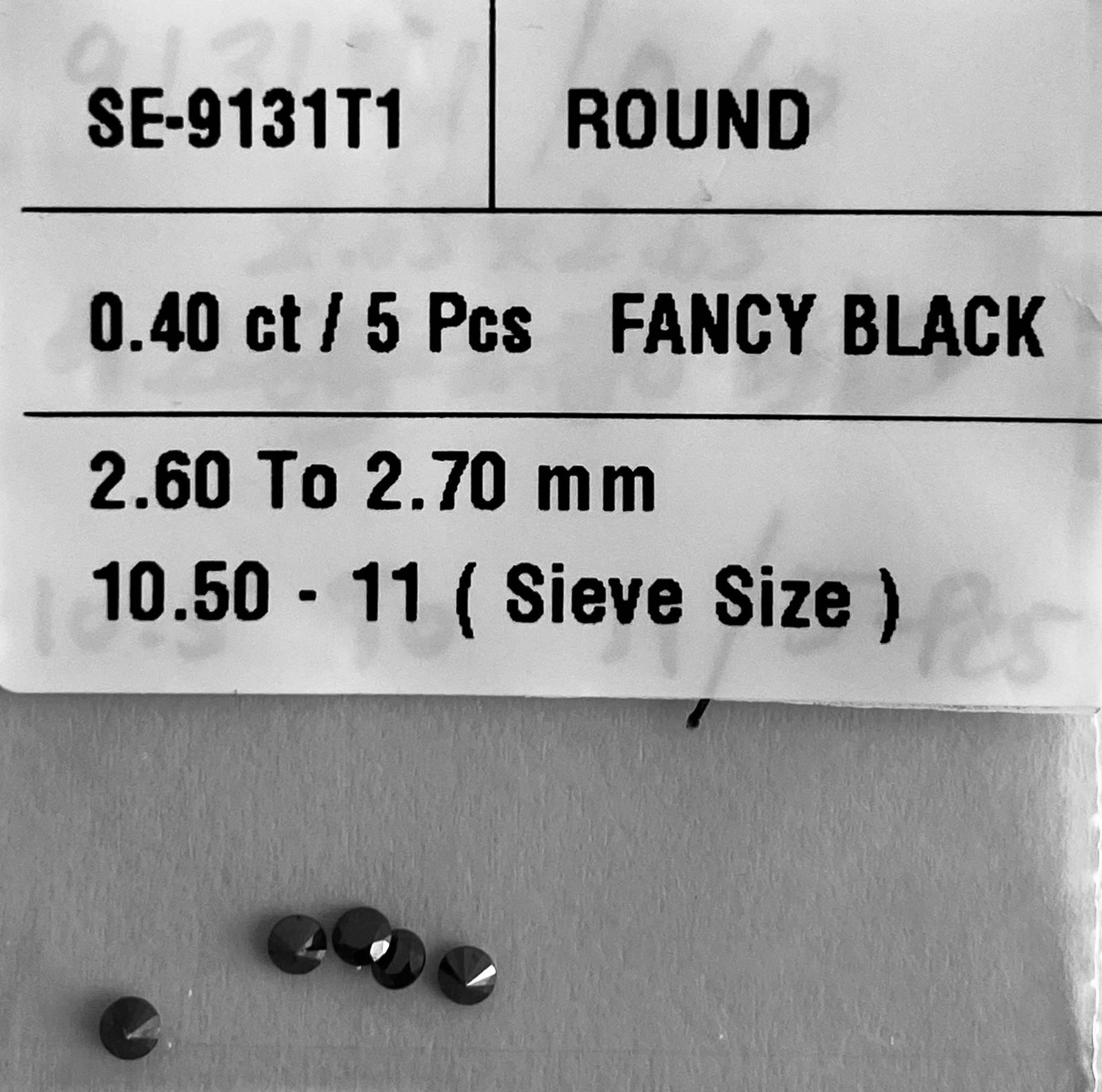 Loose Diamond - ROUND 0.4ct Fancy Black VVS2: Loose Diamond - ROUND 0.4ct Fancy Black VVS2 Source: Natural Shape: ROUND Carats: 0.4 Color: Fancy Black Certification: NONE The Diamond Depot Guarantee: All items in this auction are guaranteed