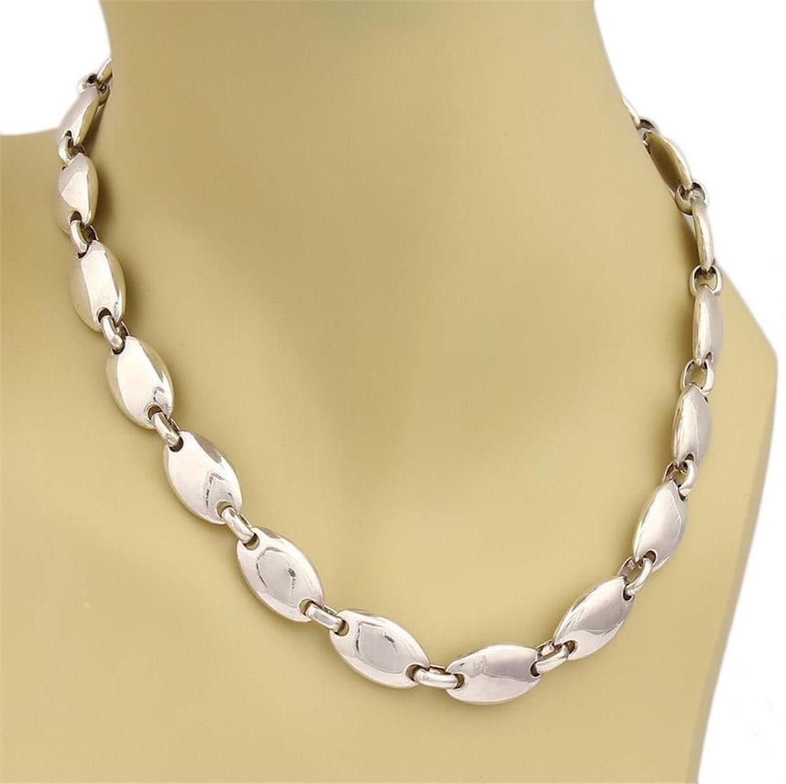 Sterling Silver Pebbles Oval Link Necklace Signed by Tiffany: Sterling Silver Pebbles Oval Link Necklace Signed by Tiffany This vintage Tiffany & Co. necklace features an elegant pebbles oval link design crafted from sterling silver. The necklace is signed by Ti