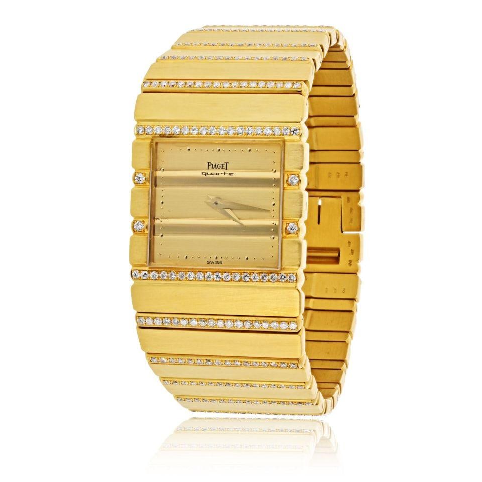 Piaget Polo Diamond 18K Yellow Gold Watch with Box 7 Inch: Piaget Polo Diamond 18K Yellow Gold Watch with Box 7 Inch This vintage Piaget Polo watch is crafted from 18K yellow gold and features diamond accents. Weighing 132.2 grams, it presents a bold and luxu