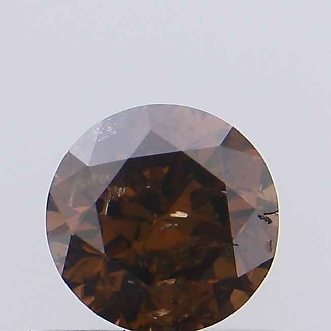 Loose Diamond - ROUND 0.42ct Fancy Reddish Brown I2: Loose Diamond - ROUND 0.42ct Fancy Reddish Brown I2 Source: Natural Shape: ROUND Carats: 0.42 Color: Fancy Reddish Brown Certification: NONE Video:
