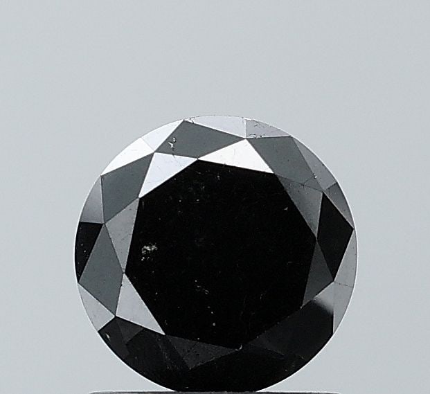 Loose Diamond - ROUND 1.39ct Black VS1: Loose Diamond - ROUND 1.39ct Black VS1 Source: Natural Shape: ROUND Carats: 1.39 Color: Black Certification: NONE Video: Video Link The Diamond Depot Guarantee: All items in this auction are