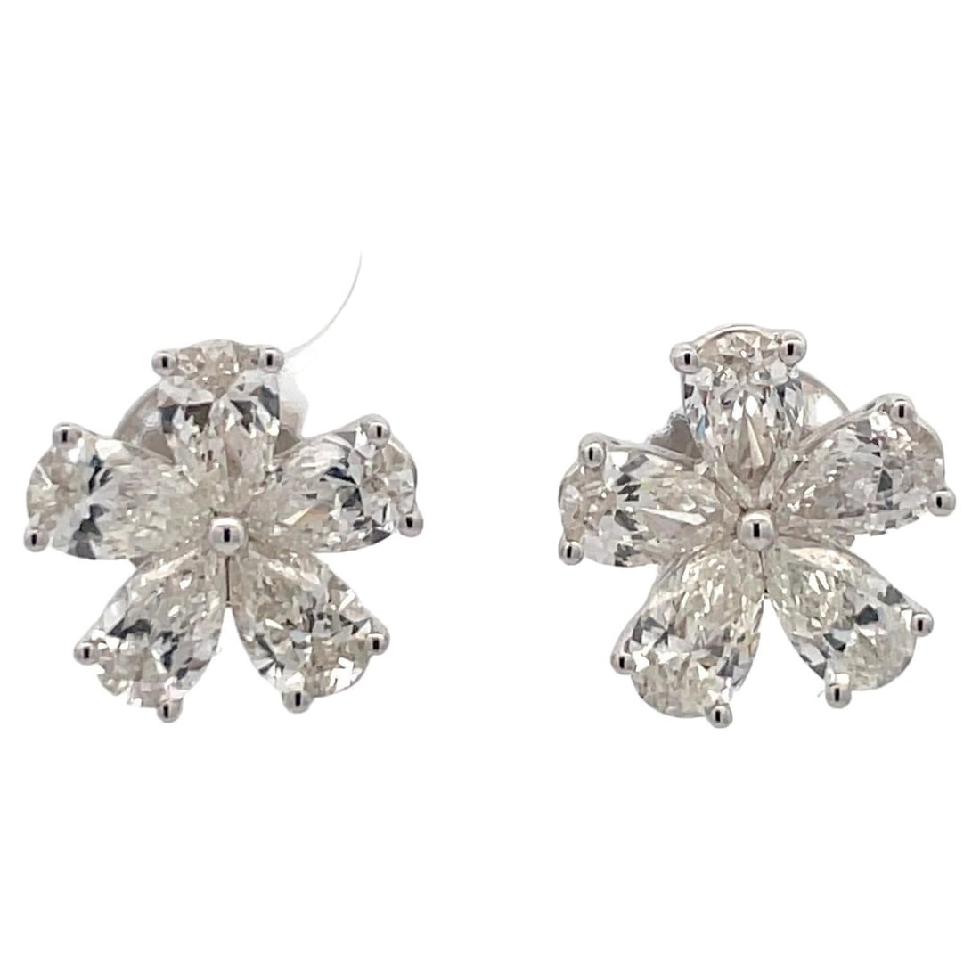 Harbor Diamonds 18K White Gold Floral Earrings 3.15 Carats Pear Shape Diamonds: Harbor Diamonds 18K White Gold Floral Earrings 3.15 Carats Pear Shape Diamonds These exquisite 18 Karat white gold floral earrings are adorned with a stunning cluster of 10 pear shape diamonds,