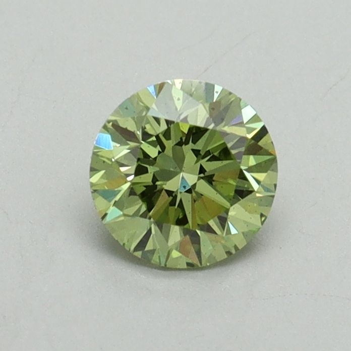 Loose Diamond - ROUND 0.54ct Fancy Vivid Green SI1: Loose Diamond - ROUND 0.54ct Fancy Vivid Green SI1 Source: This is a real non-mined Diamond that has been grown in a lab Shape: ROUND Carats: 0.54 Color: Fancy Vivid Green Certification: IGI Video: