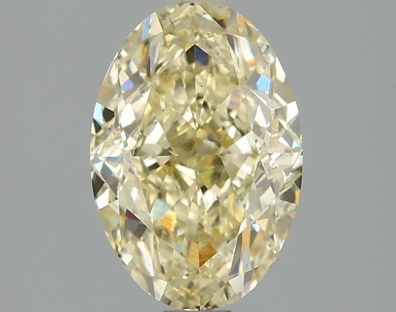 Loose Diamond - OVAL 2.1ct Fancy Intense Yellow VS1: Loose Diamond - OVAL 2.1ct Fancy Intense Yellow VS1 Source: This is a real non-mined Diamond that has been grown in a lab Shape: OVAL Carats: 2.1 Color: Fancy Intense Yellow Certification: IGI Video: