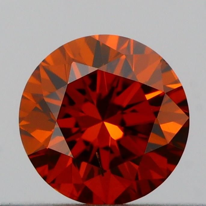 Loose Diamond - ROUND 0.23ct Fancy Deep Orange VS2: Loose Diamond - ROUND 0.23ct Fancy Deep Orange VS2 Source: This is a real non-mined Diamond that has been grown in a lab Shape: ROUND Carats: 0.23 Color: Fancy Deep Orange Certification: IGI Video: