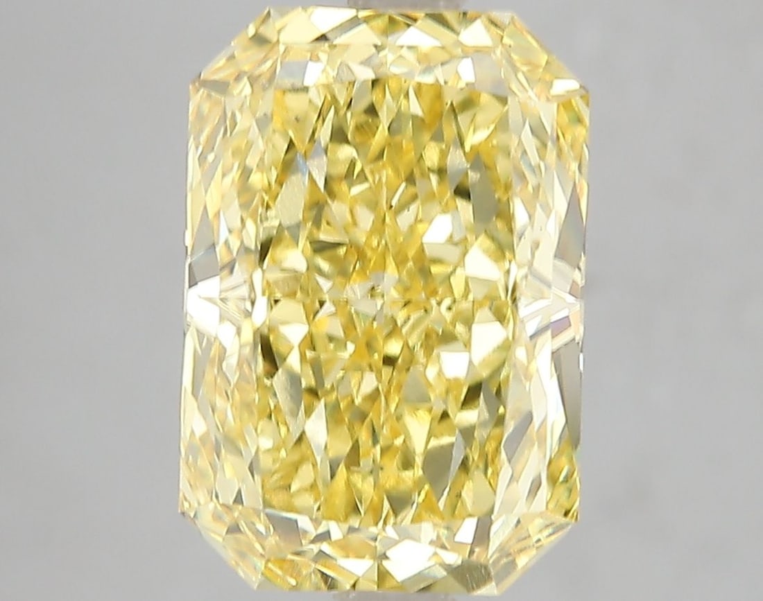 Loose Diamond - RADIANT 5.03ct Fancy Vivid Yellow VS2: Loose Diamond - RADIANT 5.03ct Fancy Vivid Yellow VS2 Source: This is a real non-mined Diamond that has been grown in a lab Shape: RADIANT Carats: 5.03 Color: Fancy Vivid Yellow Certification: IGI